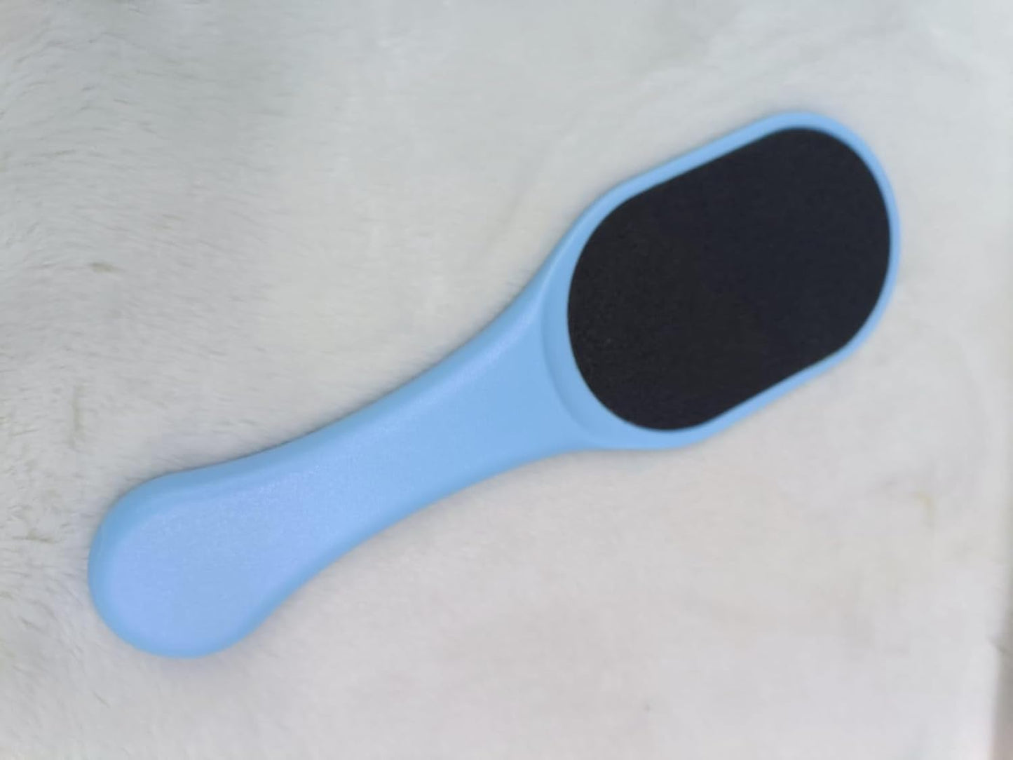 Beauty Foot Scraper featuring a 2 sided surface and durable plastic handle