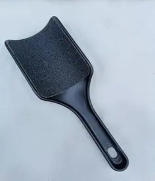 Pedicure Foot Filer featuring a 2 sided surface and sturdy plastic handle in black