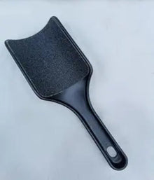 Pedicure Foot Filer featuring a 2 sided surface and sturdy plastic handle in black
