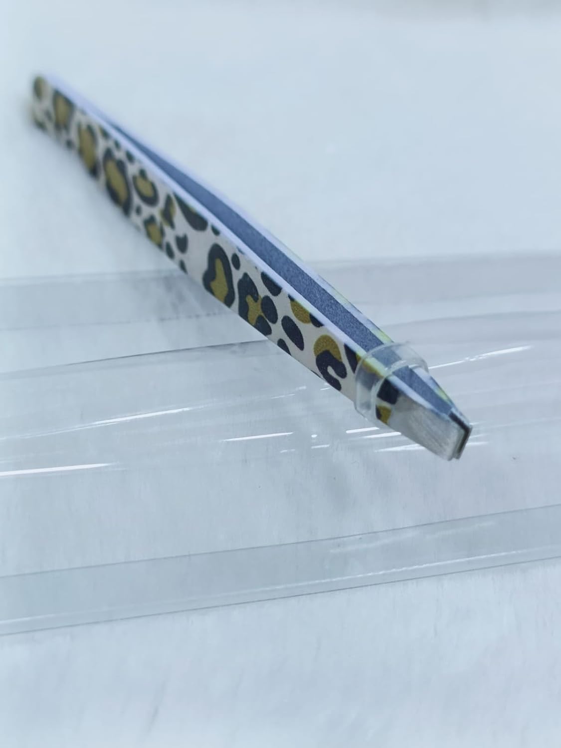 Stainless Steel Eyebrow Tweezers – Stylish Tiger Print Design