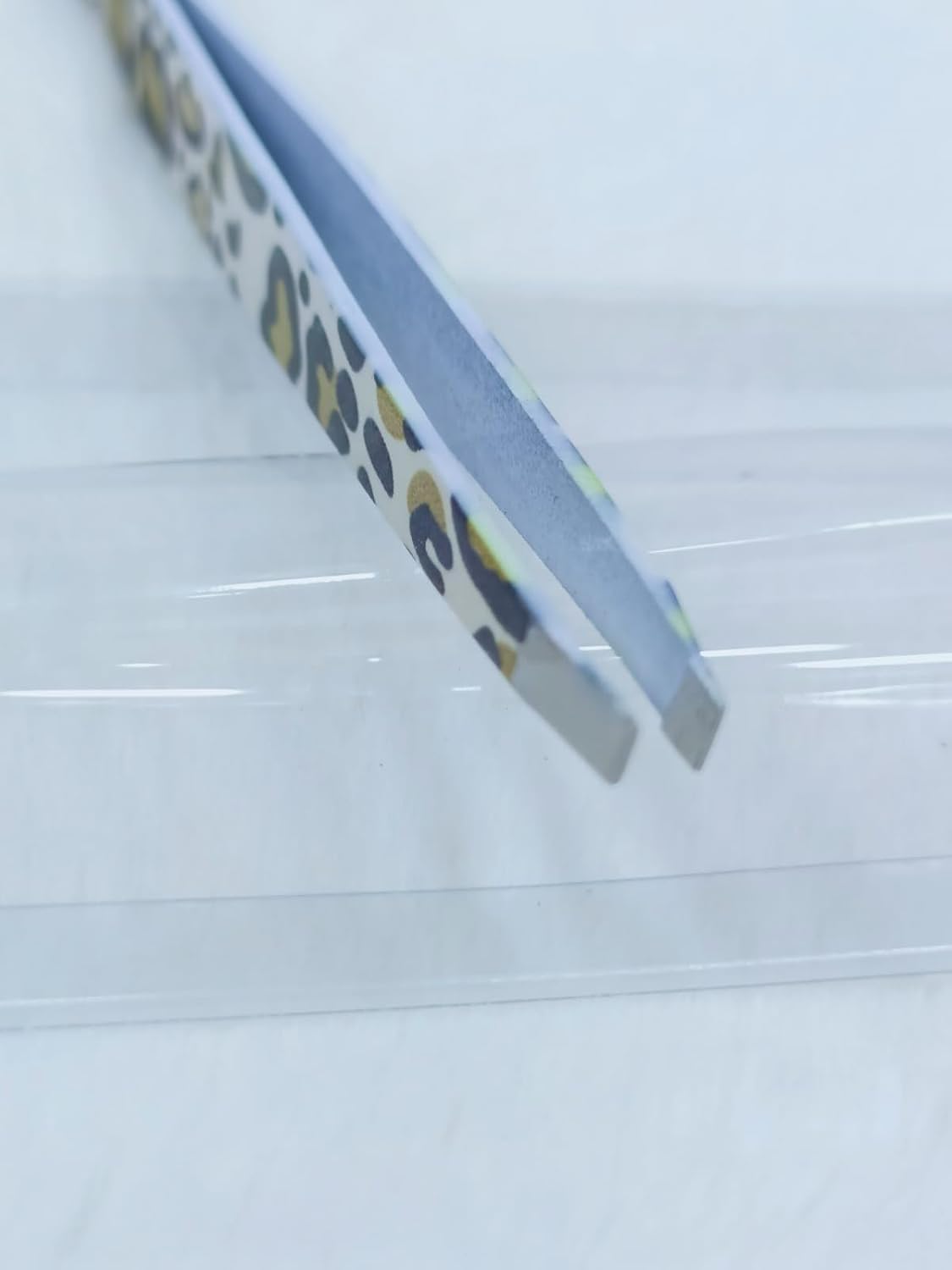 Stainless Steel Eyebrow Tweezers – Stylish Tiger Print Design