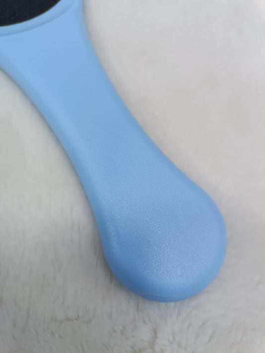 Beauty Foot Scraper featuring a 2 sided surface and durable plastic handle