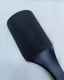 Pedicure Foot Filer featuring a 2 sided surface and sturdy plastic handle in black