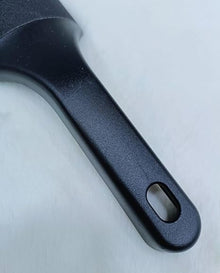Pedicure Foot Filer featuring a 2 sided surface and sturdy plastic handle in black