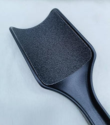 Pedicure Foot Filer featuring a 2 sided surface and sturdy plastic handle in black