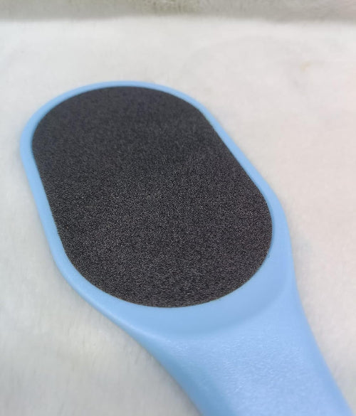 Beauty Foot Scraper featuring a 2 sided surface and durable plastic handle