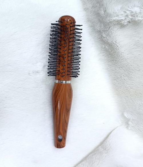 Woman Hand with Round Hair Brush on White Background – Perfect Styling Companion