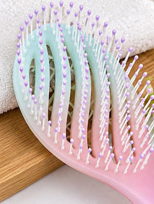DreamShine Hair Brush glides smoothly through your hair
