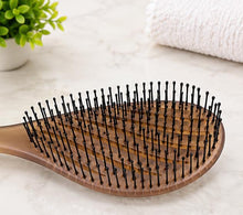 GlowNest Hair Brush gently detangles knots