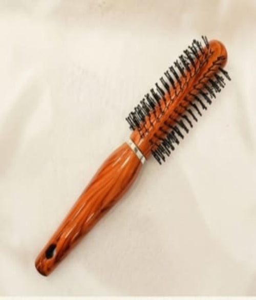 Woman Hand with Round Hair Brush on White Background – Perfect Styling Companion