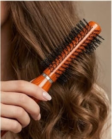 Woman Hand with Round Hair Brush on White Background – Perfect Styling Companion