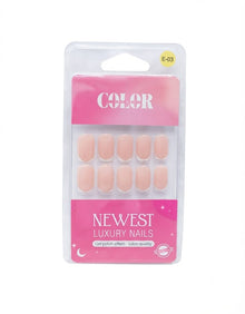 Color Secret Newest Luxury Nails featuring a glossy nude base with deep red French tips.